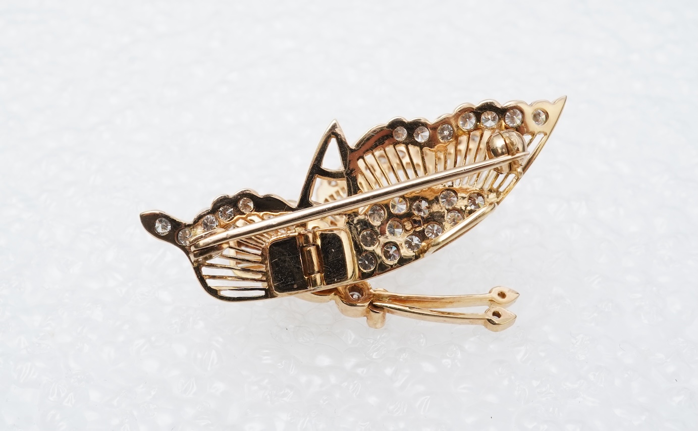 A diamond butterfly brooch